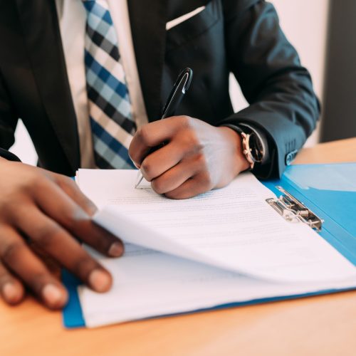 professional-businessman-working-with-documents-his-modern-office